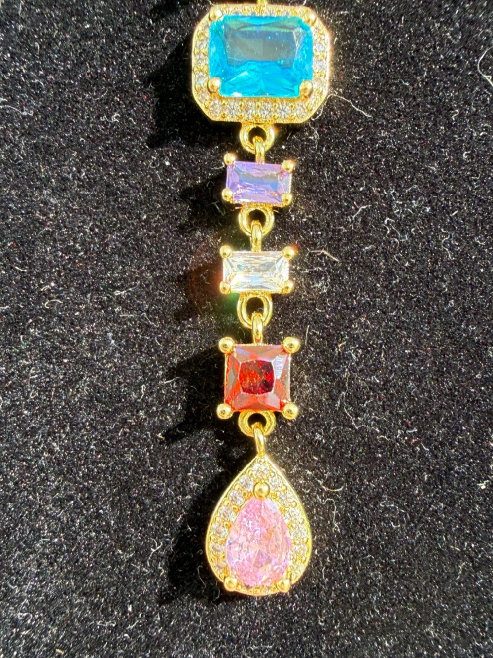 Multicolored gemstone necklace cascading down with sparkly colors - Picture 6 of 7